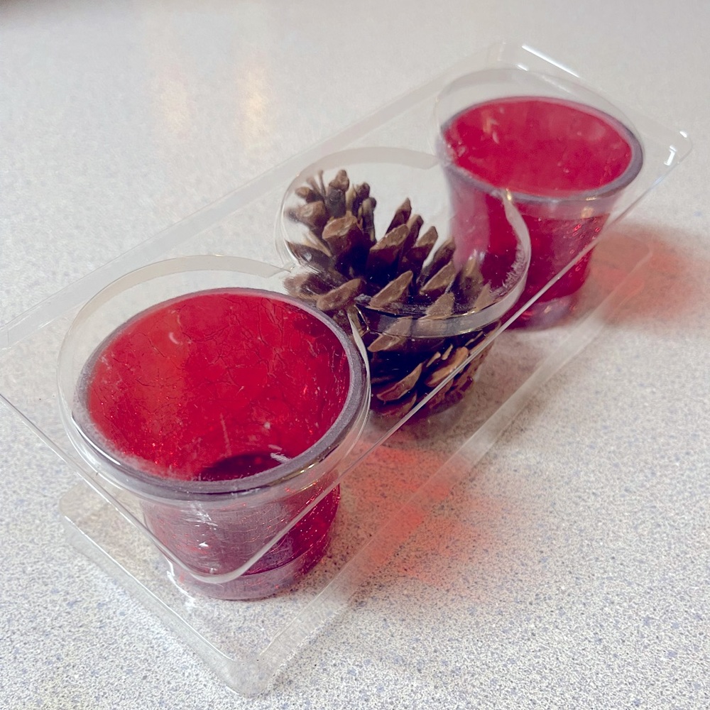 Two candle holders w/ pine cone
